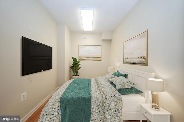 bedroom featuring hardwood / wood-style floors