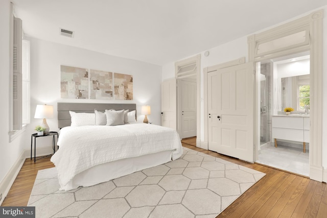 bedroom featuring light hardwood / wood-style floors