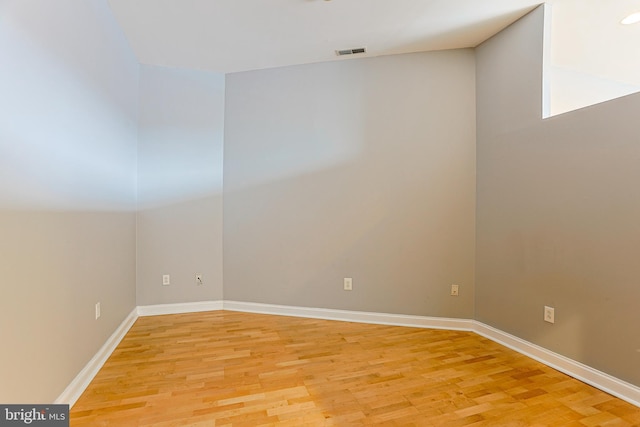 empty room with light wood-type flooring