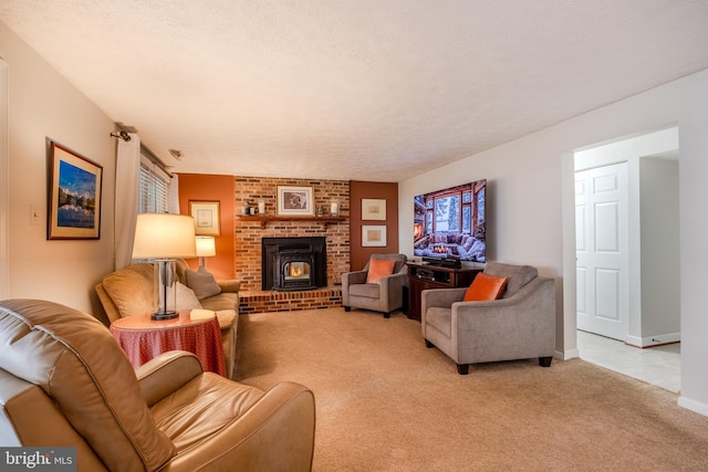 carpeted living room featuring a textured ceiling