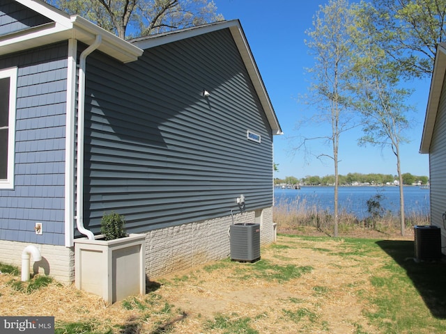 1240 Shore Dr, Colonial Beach, VA 22443 - view of home's exterior with central air condition unit and a water view