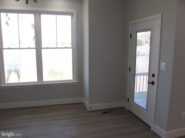 1240 Shore Dr, Colonial Beach, VA 22443 - foyer with wood finished floors and baseboards