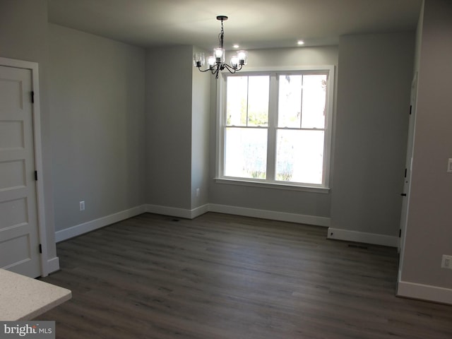 1240 Shore Dr, Colonial Beach, VA 22443 - unfurnished dining area featuring a chandelier, dark wood-style floors, baseboards, and recessed lighting
