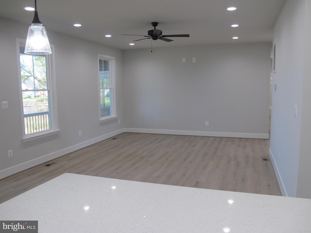 1240 Shore Dr, Colonial Beach, VA 22443 - unfurnished room featuring wood finished floors, recessed lighting, baseboards, and a ceiling fan