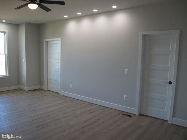 1240 Shore Dr, Colonial Beach, VA 22443 - spare room featuring ceiling fan, wood finished floors, baseboards, and recessed lighting