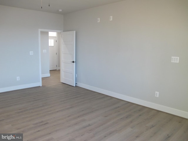 1240 Shore Dr, Colonial Beach, VA 22443 - empty room with baseboards and wood finished floors
