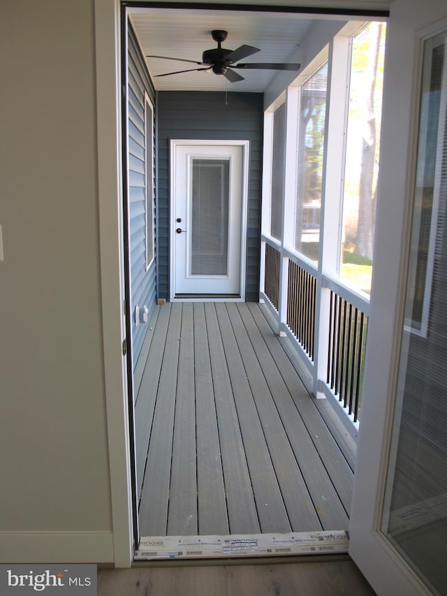 1240 Shore Dr, Colonial Beach, VA 22443 - unfurnished sunroom featuring ceiling fan