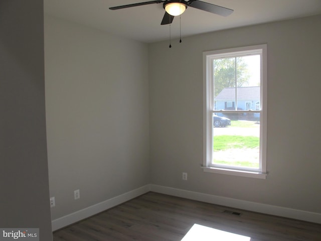 1240 Shore Dr, Colonial Beach, VA 22443 - unfurnished room featuring baseboards, ceiling fan, and wood finished floors