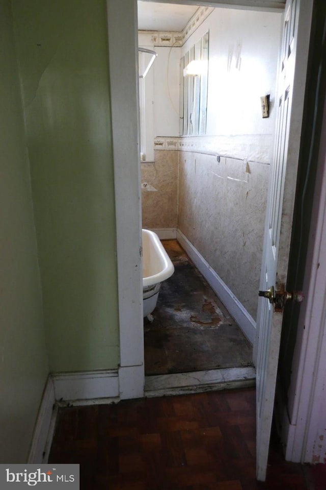 bathroom with wood-type flooring