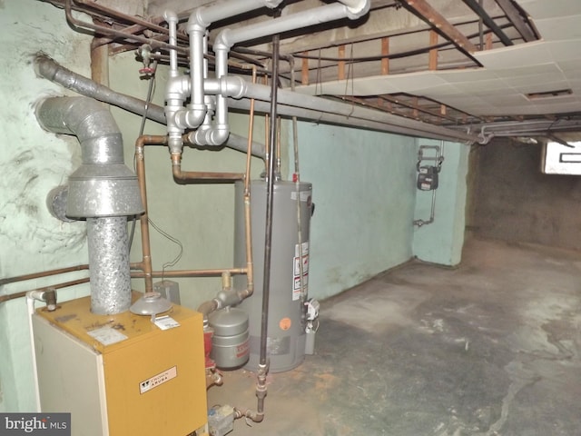 utility room featuring gas water heater