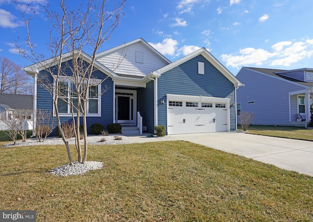 front of property with a garage and a front lawn