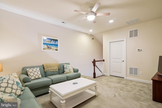 living room featuring light colored carpet and ceiling fan