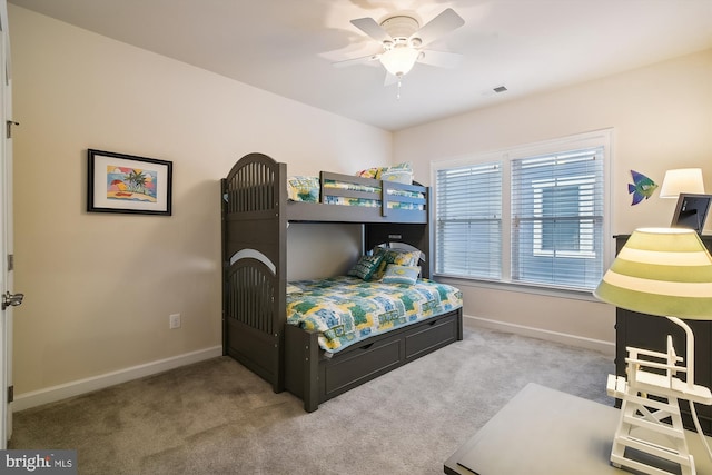 carpeted bedroom featuring ceiling fan