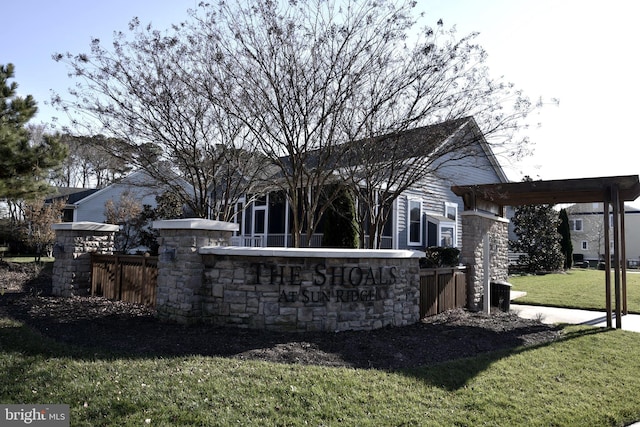 exterior space with a lawn and a pergola