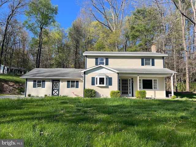2742 Pennington Rd, Tyrone, PA 16686 - traditional-style house featuring a chimney and a front yard