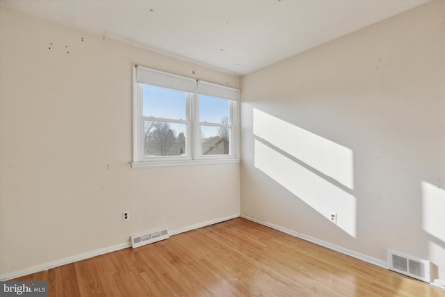 empty room featuring light hardwood / wood-style floors