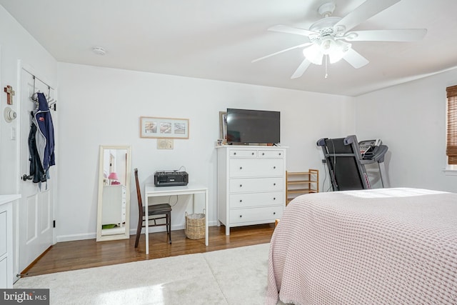 bedroom featuring ceiling fan and wood-type flooring