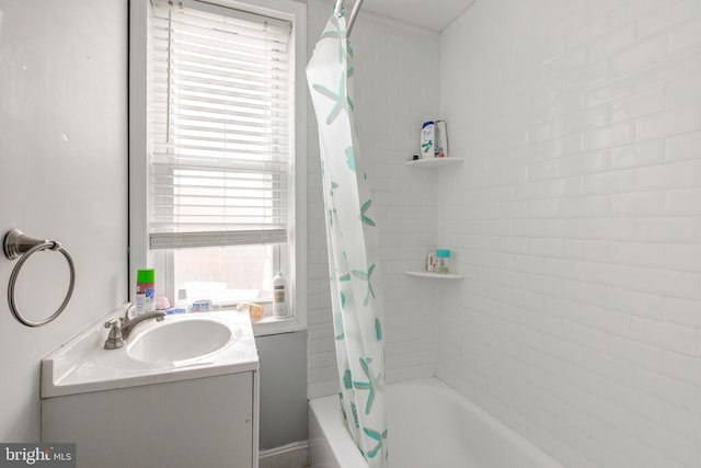 bathroom with vanity and shower / bathtub combination with curtain