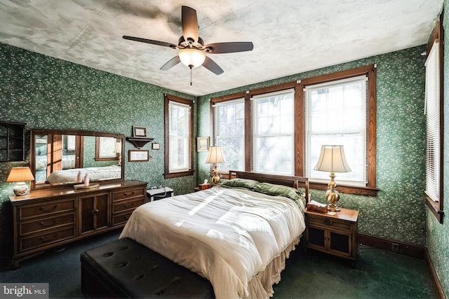 carpeted bedroom with ceiling fan