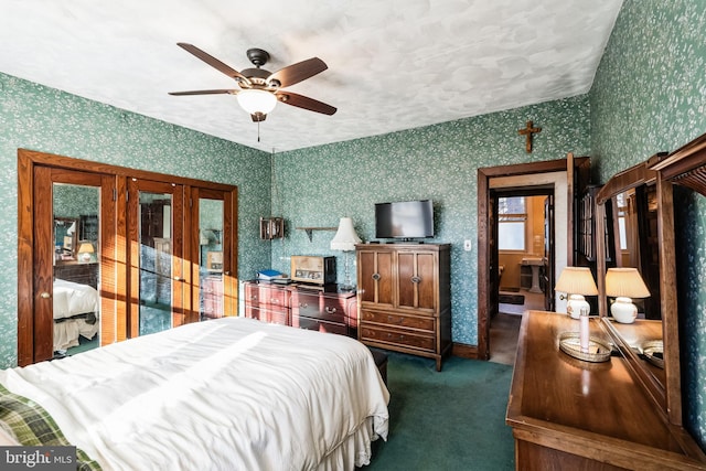 bedroom with ceiling fan and carpet floors