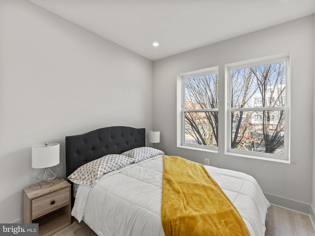 bedroom featuring hardwood / wood-style floors