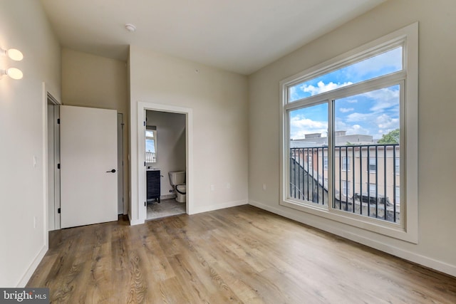 unfurnished bedroom with light hardwood / wood-style flooring