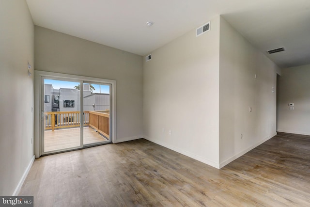 unfurnished room featuring light hardwood / wood-style floors