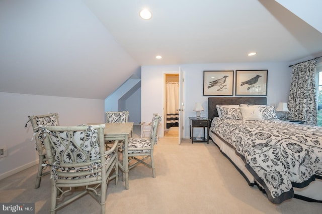 bedroom with lofted ceiling, light carpet, baseboards, and recessed lighting