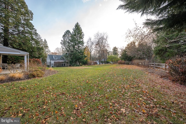 view of yard featuring fence