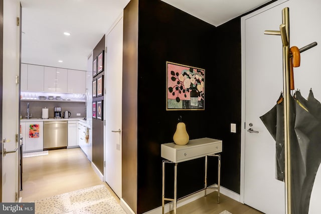 corridor featuring light hardwood / wood-style flooring