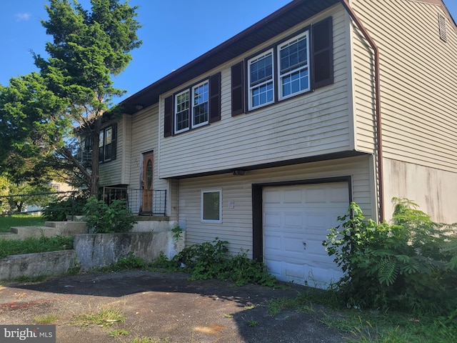 view of home's exterior featuring a garage