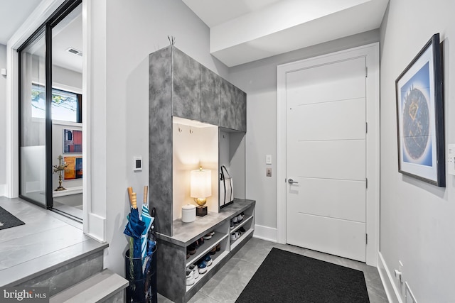 mudroom featuring visible vents and baseboards