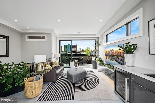 living area featuring light tile patterned floors, wine cooler, and recessed lighting