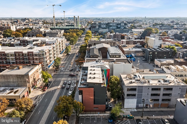 birds eye view of property with a view of city