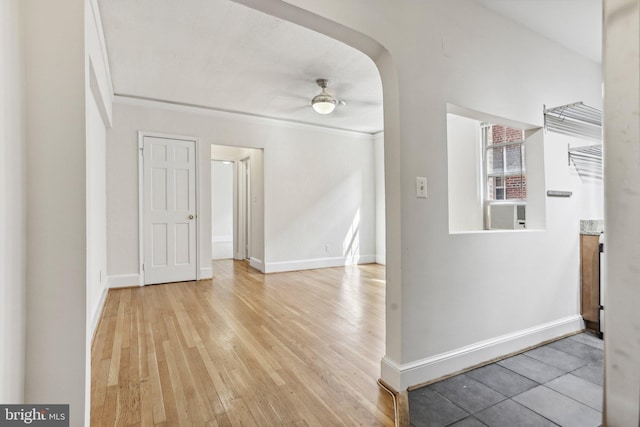 interior space featuring ceiling fan and wood-type flooring