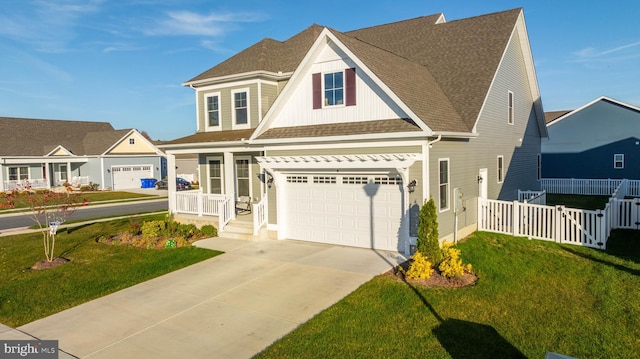 view of front facade with a garage and a front yard