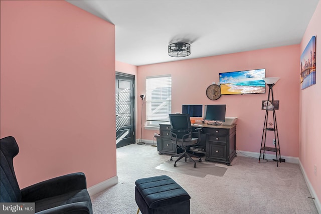 office area featuring light carpet