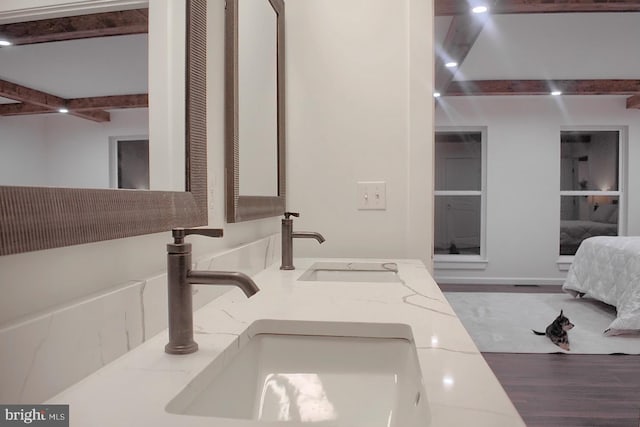126 Saffron Blvd, Centre Hall, PA 16828 - ensuite bathroom with beam ceiling, wood finished floors, and double vanity
