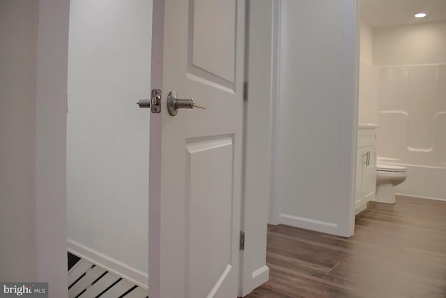 hall featuring dark hardwood / wood-style floors