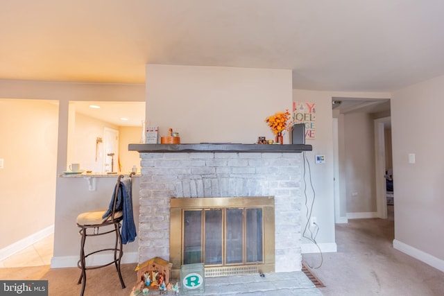 room details with carpet flooring and a fireplace