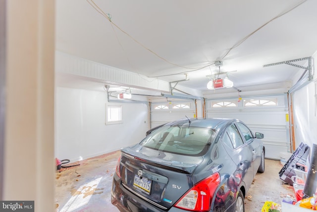 garage featuring a garage door opener