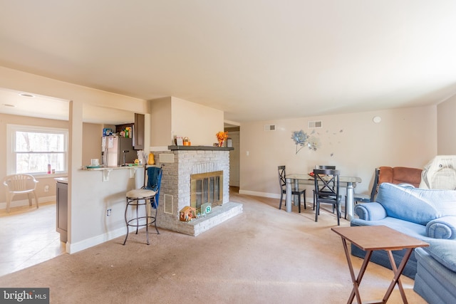 123 E Street Rd, West Chester, PA 19382 - living room featuring a brick fireplace and light colored carpet