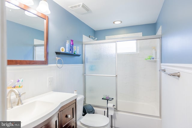 123 E Street Rd, West Chester, PA 19382 - full bathroom featuring wainscoting, vanity, and shower / bath combination with glass door