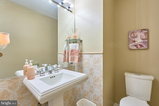 bathroom featuring sink and toilet