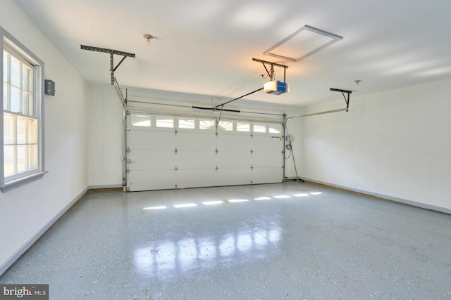 garage featuring a garage door opener