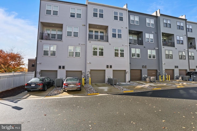 view of property featuring central AC unit