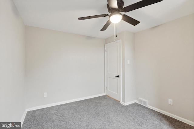 carpeted empty room with ceiling fan