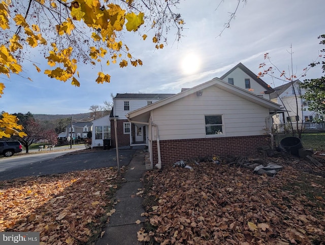 view of front of house with brick siding