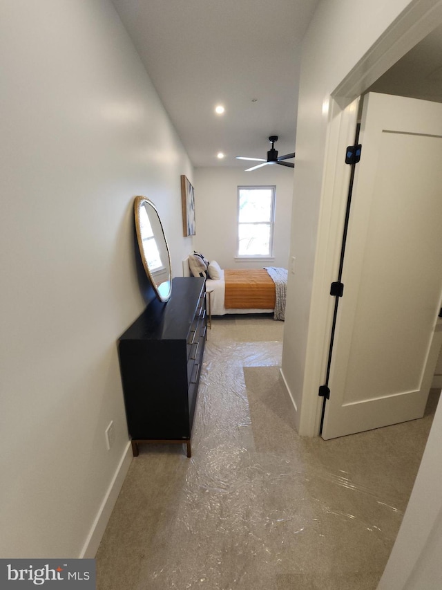 bedroom featuring baseboards, a ceiling fan, and recessed lighting