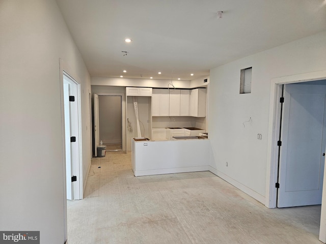 kitchen featuring white cabinetry